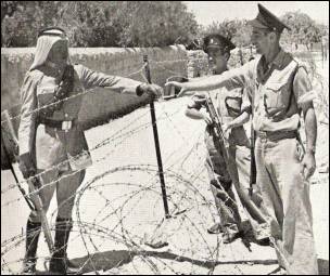 Israeli and Jordanian soldiers near the Mandelbaum gate