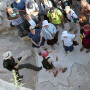 group of tourists with tour guide