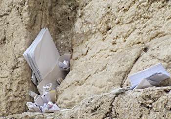 prayers inserted in the Western Wall in Jerusalem