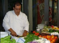 Jerusalem restaurant chef preparing Israeli salad Jerusalem restaurant chef preparing Israeli salad